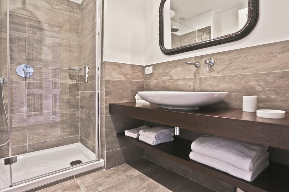 Shower, free toiletries, hair dryer, bathrobes