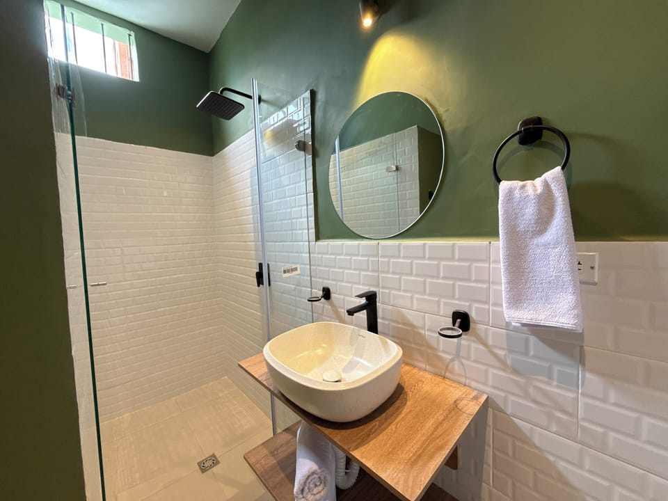 Standard Double Room | Bathroom | Shower, towels, soap, shampoo