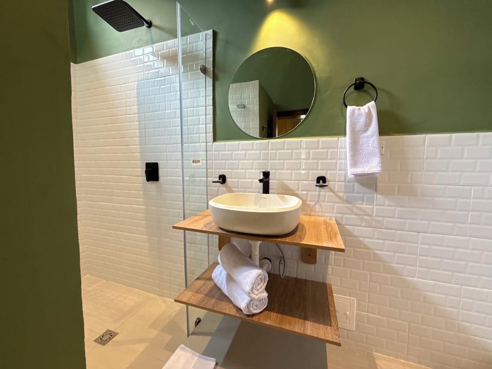 Standard Double Room | Bathroom | Shower, towels, soap, shampoo