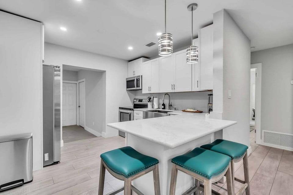 A beautiful kitchen island with bar stool seating