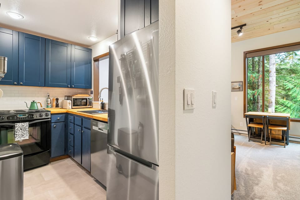 Newly-remodeled kitchen with heated tile floors