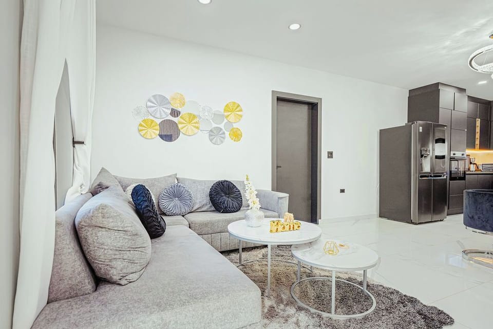 Bright and airy living room designed for comfort,a perfect for relaxing after beach days.