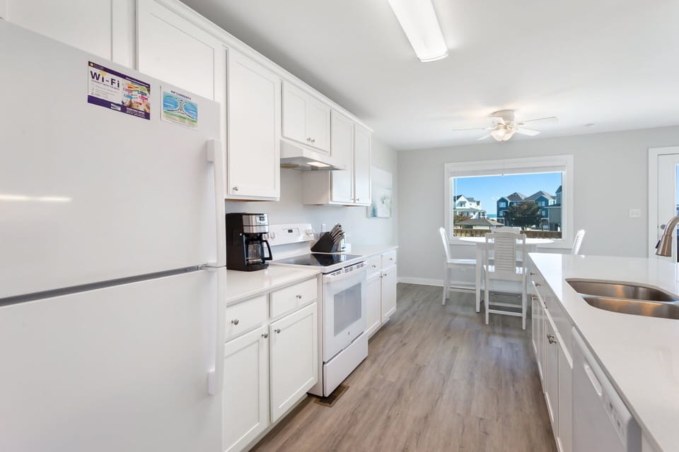 Kitchen: Well-appointed kitchen with full-size appliances, cookware, and ample counter space.