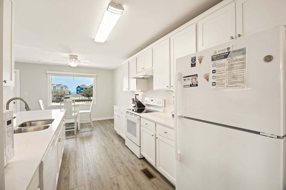 Kitchen: Well-appointed kitchen with full-size appliances, cookware, and ample counter space.