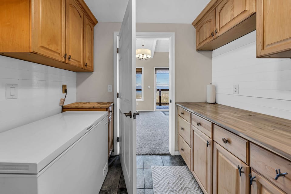 Laundry room: In-unit washer and dryer, chest freezer