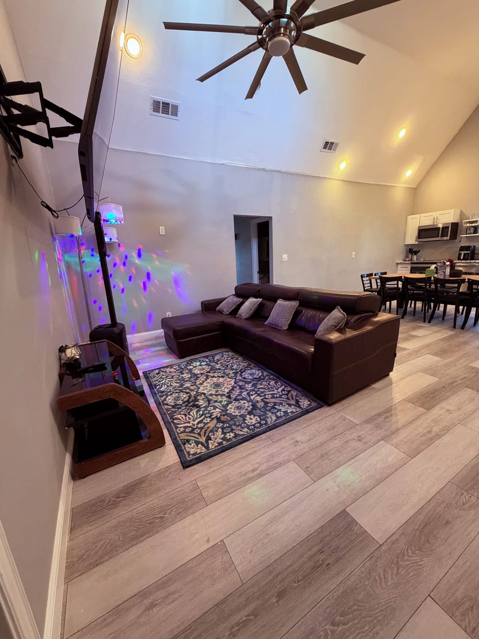 Living room equipped with disco lights and speak speaker for karaoke with mic