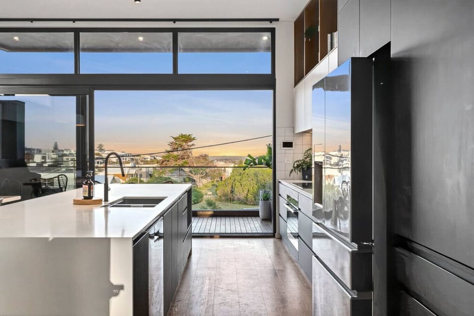 Open-plan living with panoramic coastal outlook