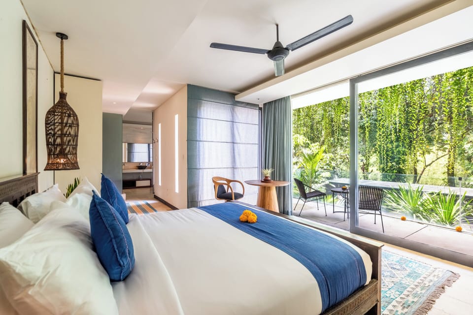Deluxe Room, Balcony, River View | In-room safe, free WiFi