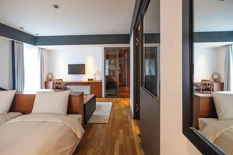 Deluxe Quadruple Room | In-room safe, desk, blackout drapes, soundproofing