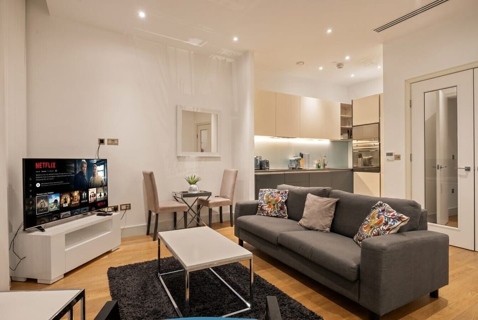 Sociable layout blending lounge, dining and kitchen seamlessly.