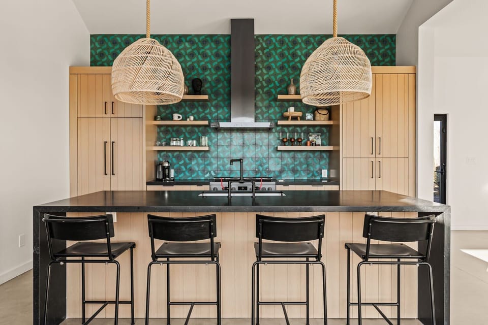 In the kitchen, the breakfast bar seats up to 4.