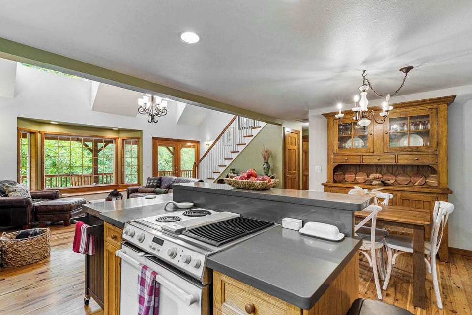 Modern convenience meets handcrafted charm. Our updated kitchen features brand new stainless steel appliances and plenty of room to prep.