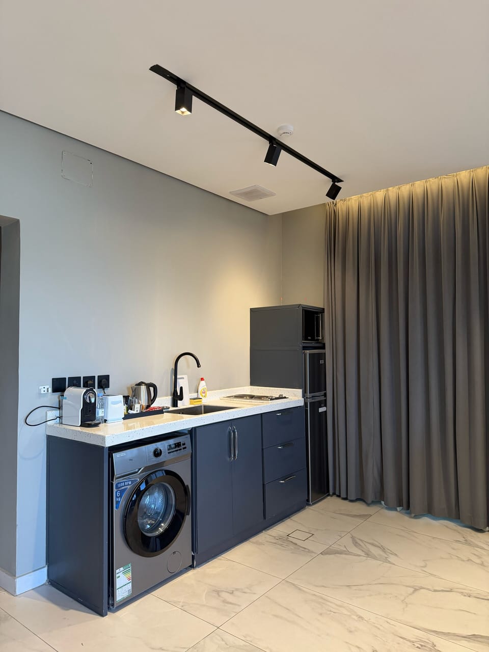 Mini-fridge, microwave, cookware/dishes/utensils