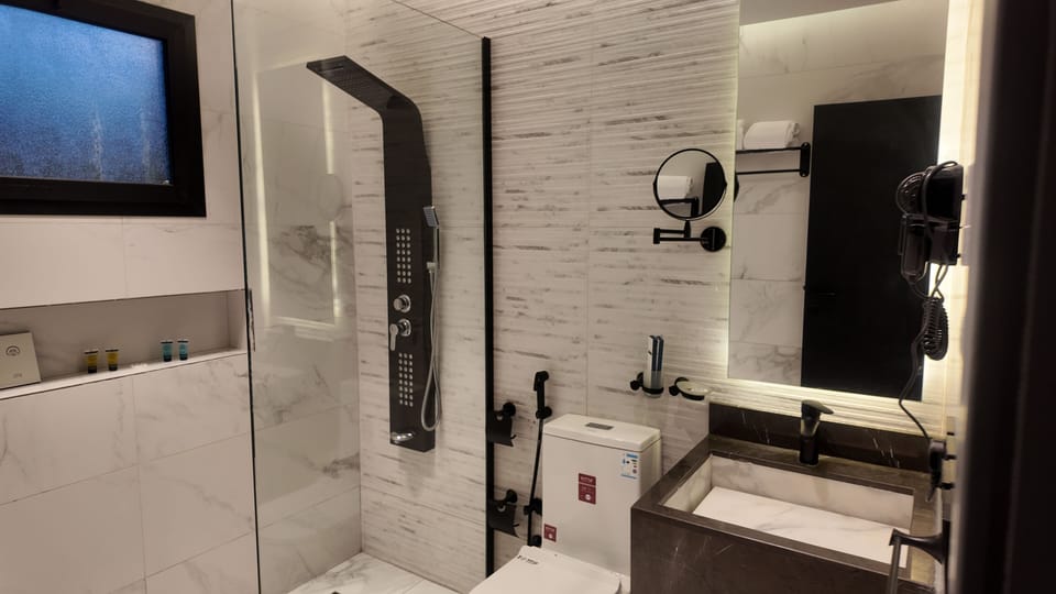 Free toiletries, hair dryer, slippers, bidet