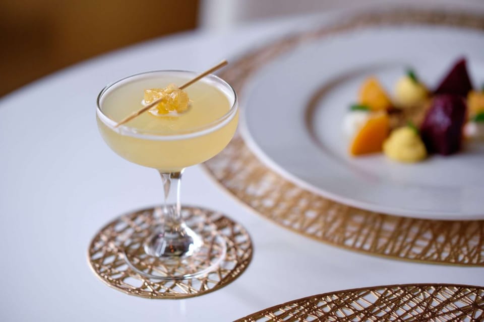 Elegant cocktail and dish.