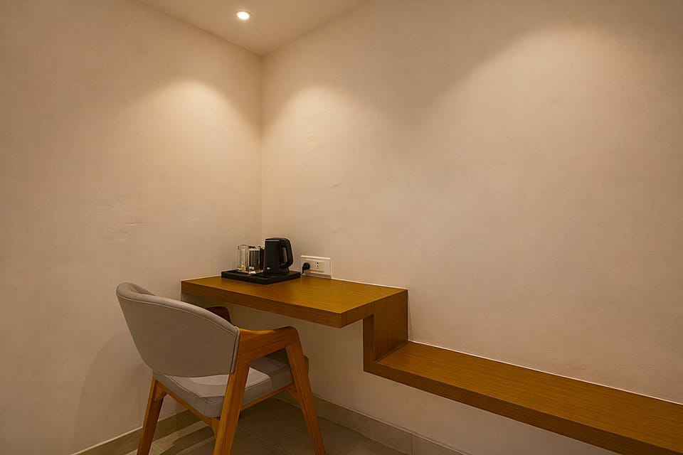 Deluxe Room With Pool View | Hypo-allergenic bedding available, down comforters, laptop workspace