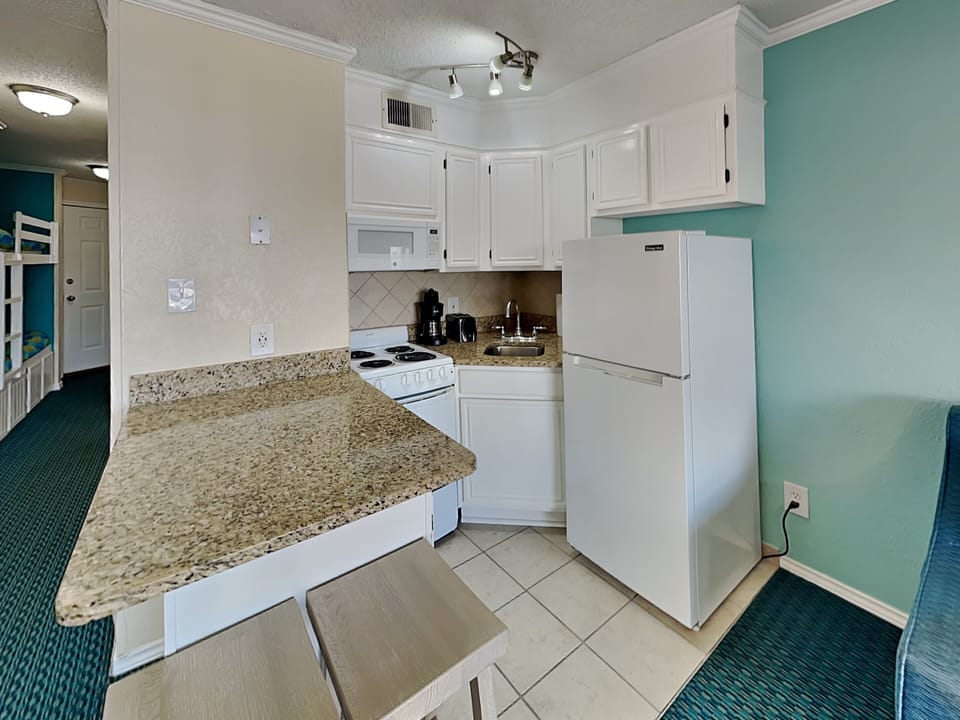 Kitchen - Fully Stocked Kitchenette With Breakfast Bar