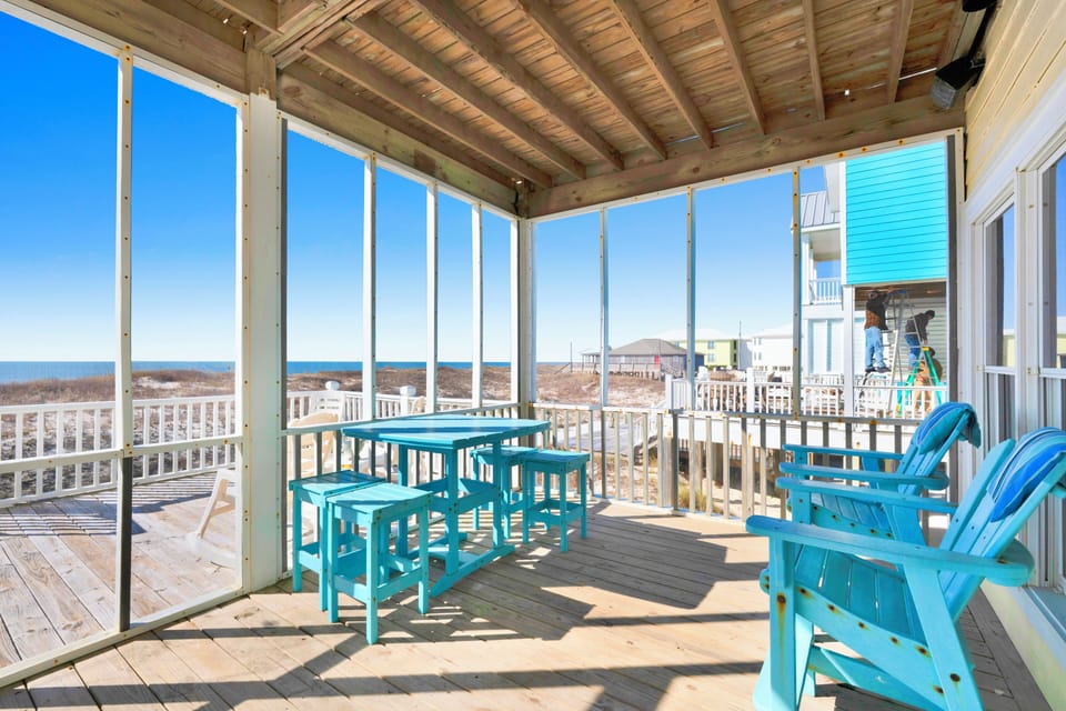 Two expansive balconies overlooking the Gulf and a screened in porch