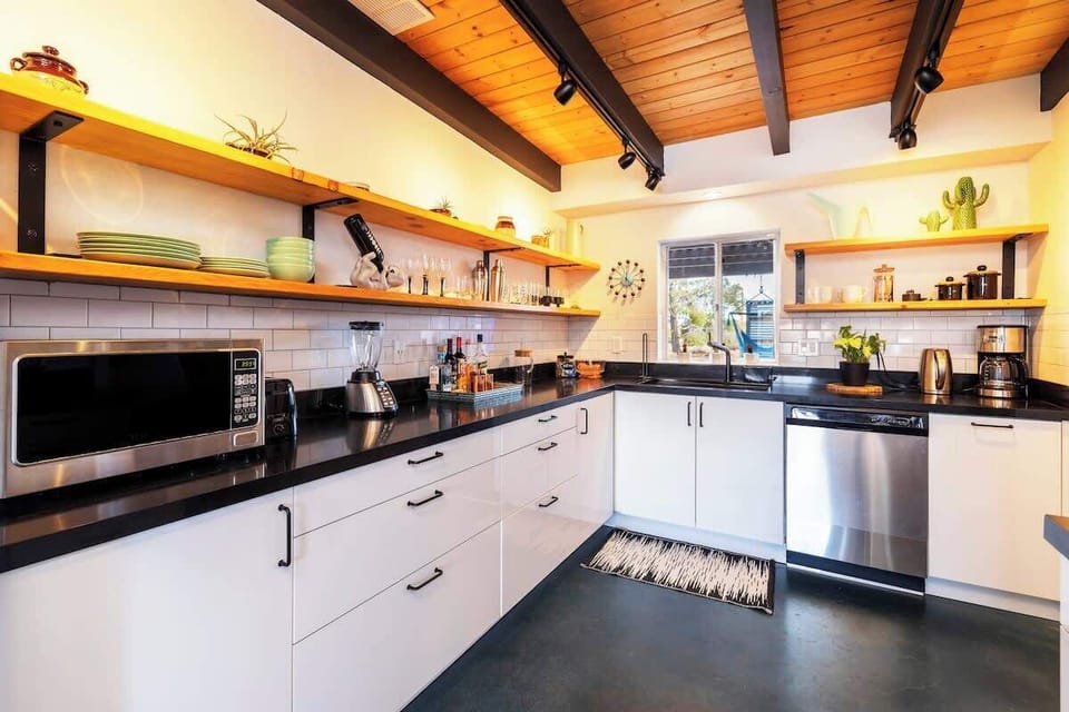 Fully equipped for casual cooking or slow breakfasts. Desert views included.