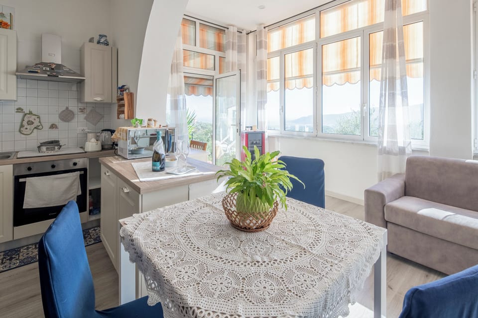 Apartment, Patio, Sea View | Private kitchen | Fridge, microwave, oven, stovetop