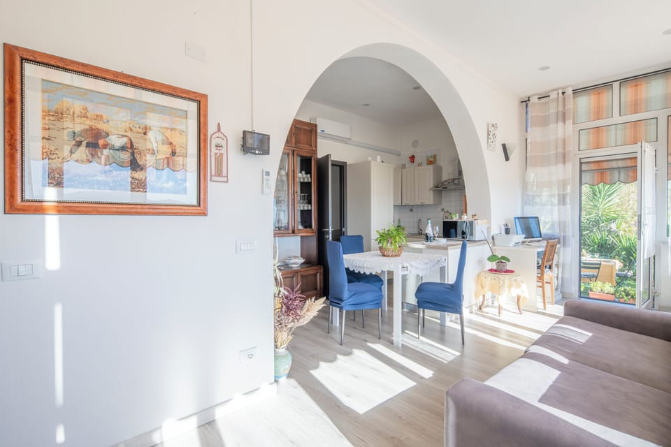 Apartment, Patio, Sea View | Living area | TV