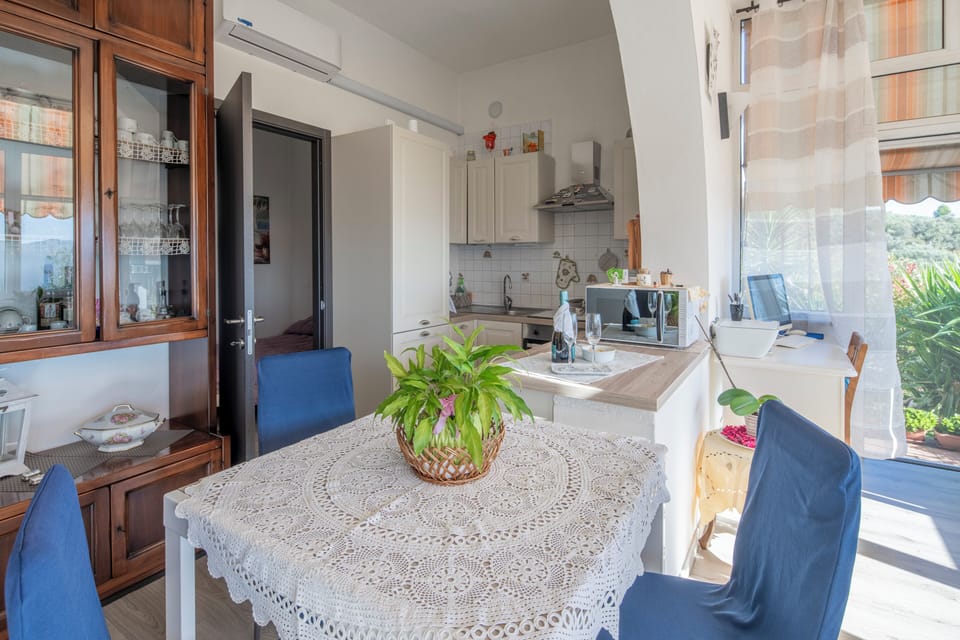Apartment, Patio, Sea View | Private kitchen | Fridge, microwave, oven, stovetop