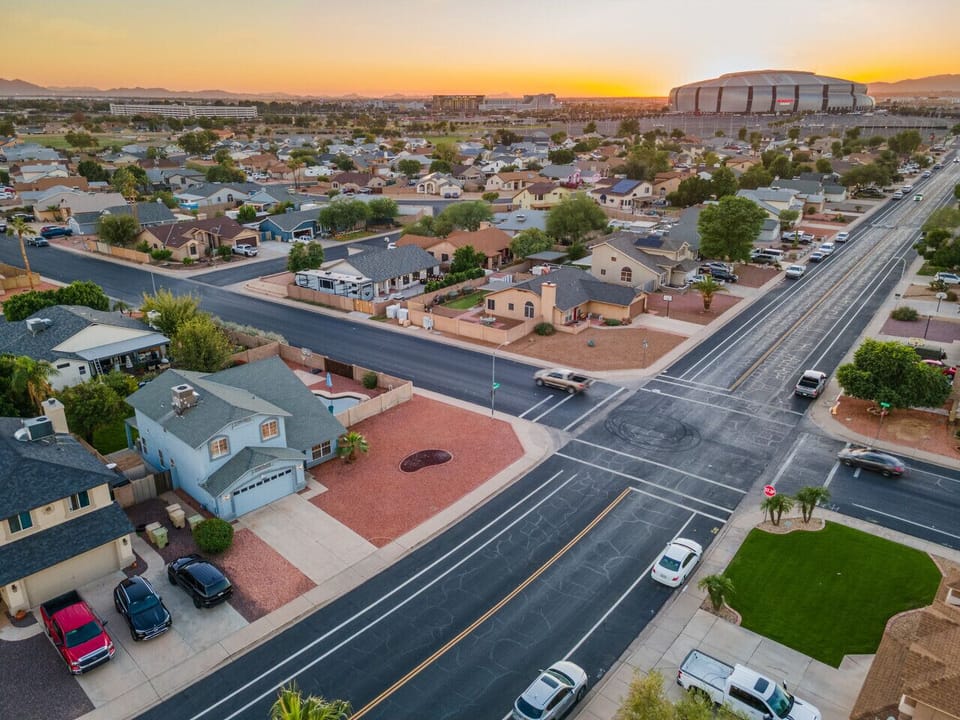 Aerial neighborhood view near the golf course and stadium area.