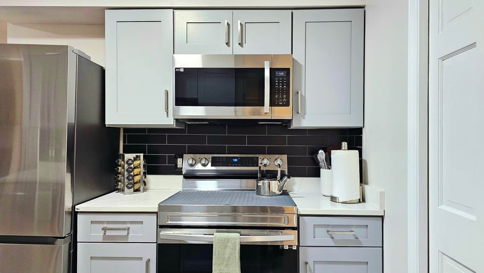Kitchen with oven and microwave