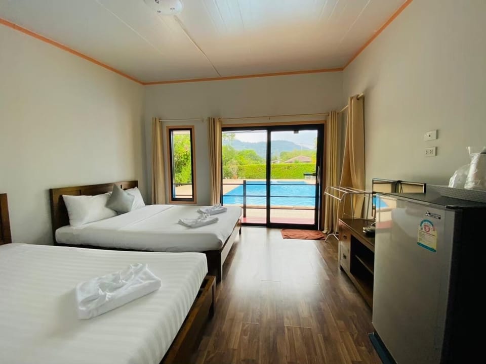 Family Room, Pool View | Desk, free WiFi