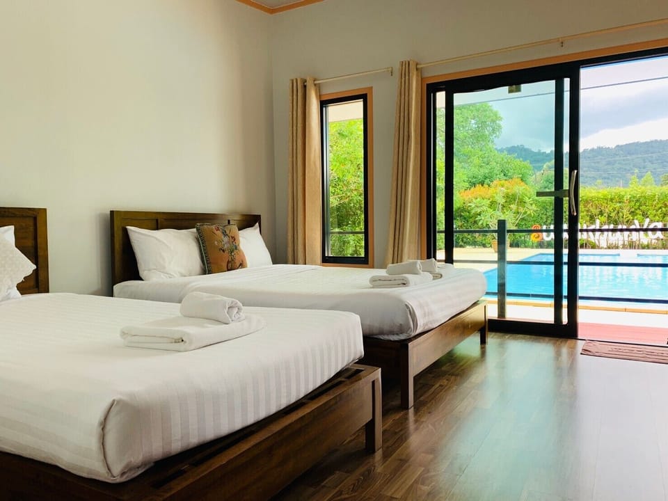 Family Room, Pool View | Desk, free WiFi