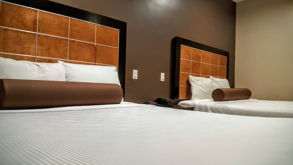 Deluxe Room, 2 Queen Beds | Premium bedding, desk, iron/ironing board (on request), WiFi (free)