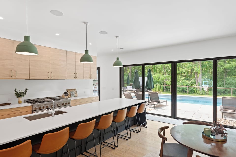 Bright, open kitchen with 48’’ range and 14-foot island