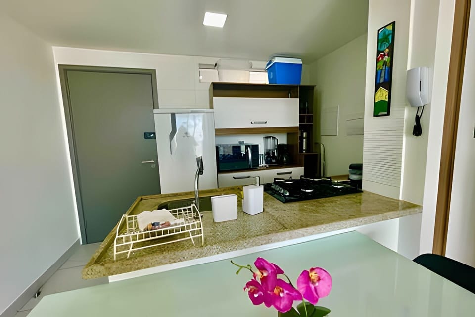 Standard Apartment | Private kitchen | Microwave, stovetop, cookware/dishes/utensils