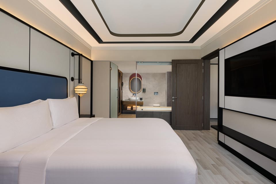 Suite, 1 King Bed, Refrigerator (Ambassador) | Egyptian cotton sheets, premium bedding, down comforters