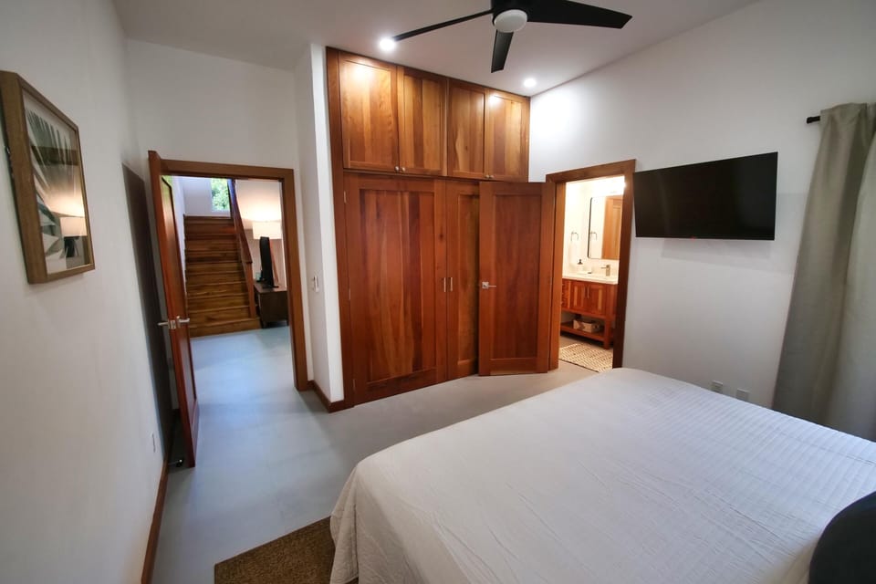 Cozy bedroom retreat with ample storage and natural light