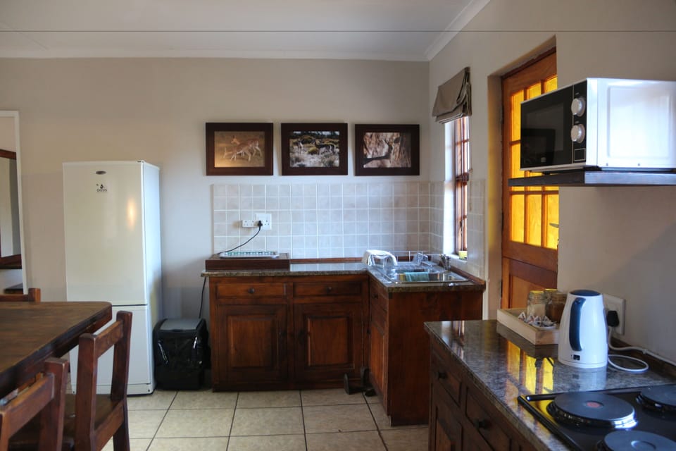 Family Room, 2 Bedrooms | Private kitchen | Electric kettle