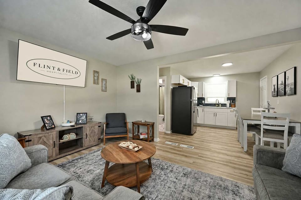 Spacious living room with seating for the whole group — ideal for relaxing after Kansas City Chiefs/Royals games or events.