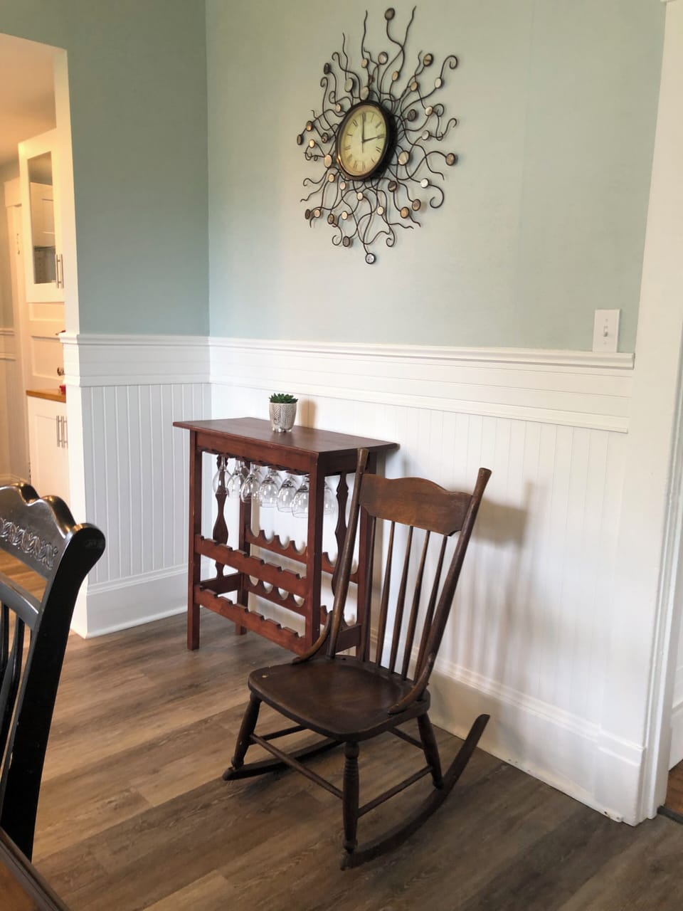 Antique rocking chair in dining room 