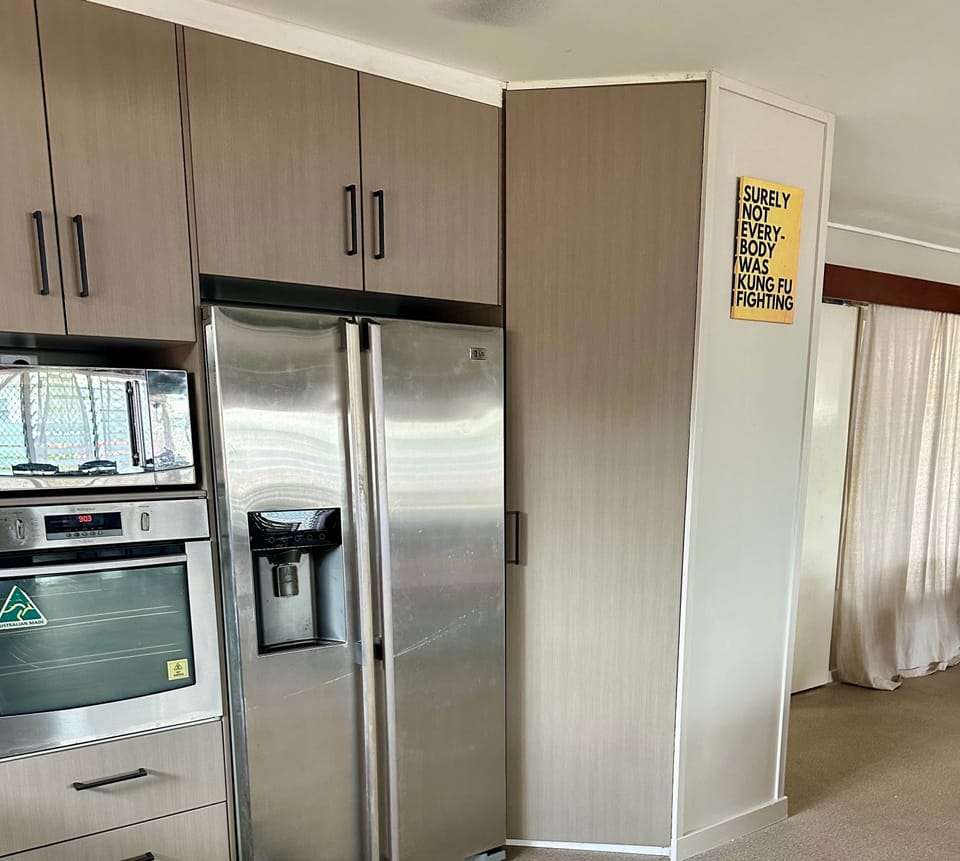 The fridge microwave and oven 