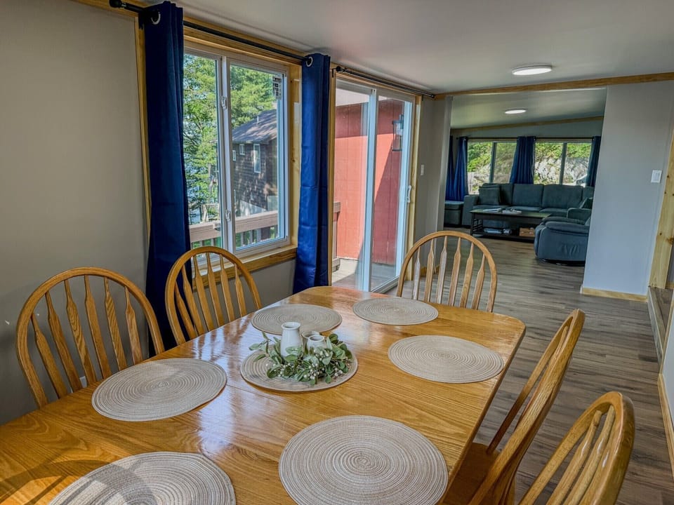 Bright dining area with seating for 6 and easy flow to the living room