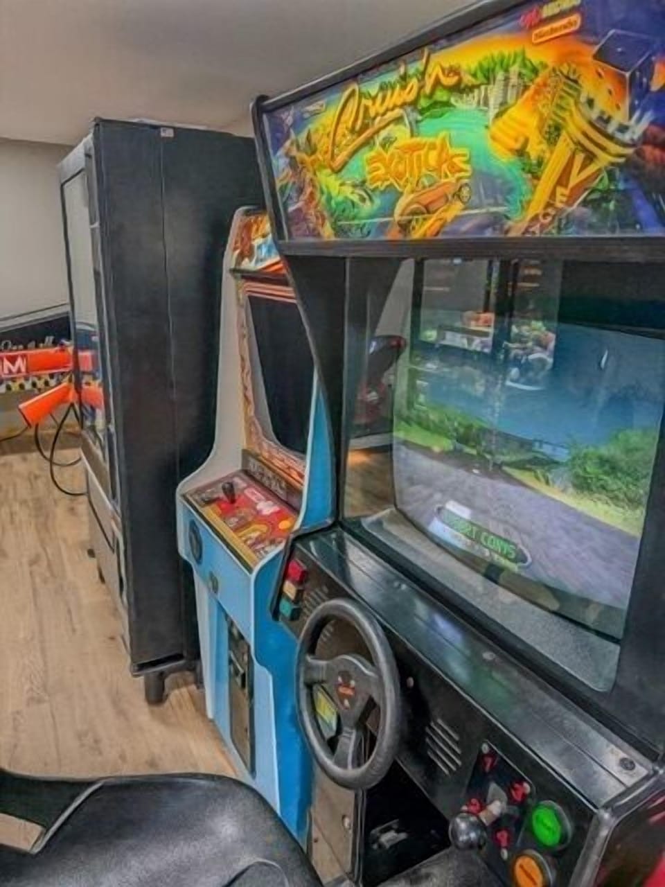 Retro arcade game room with classic cabinets for nostalgic guest fun