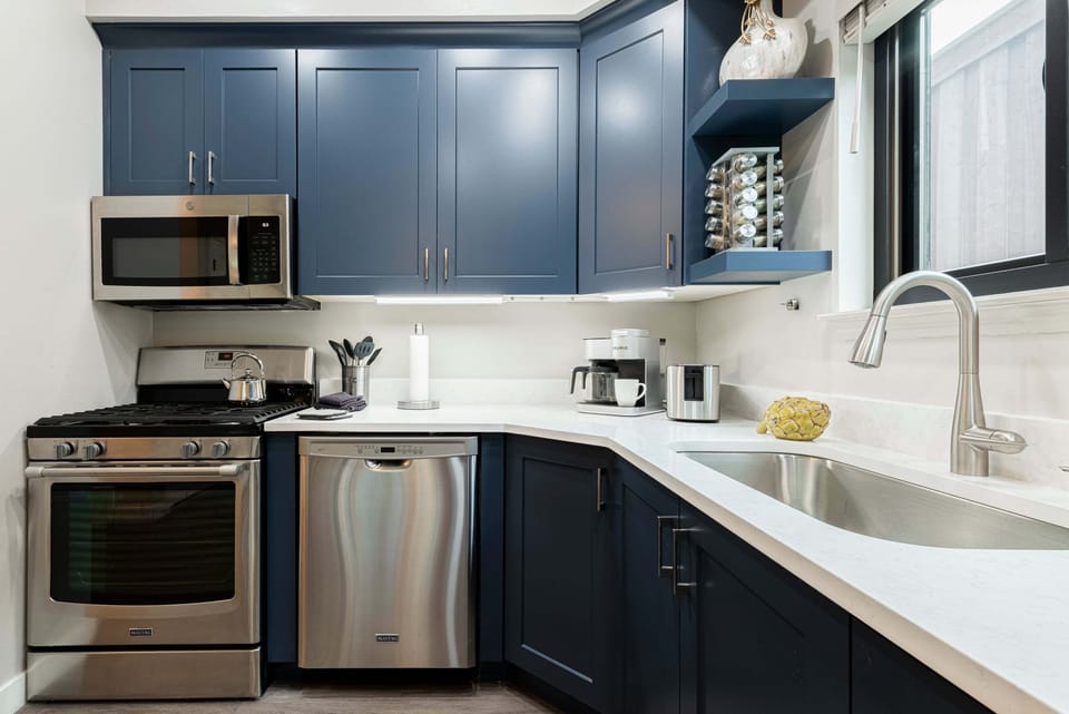 Stainless appliances and stone countertops