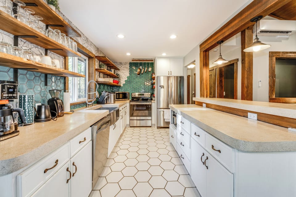Let your culinary juices flow in the fully equipped kitchen. | Main Level