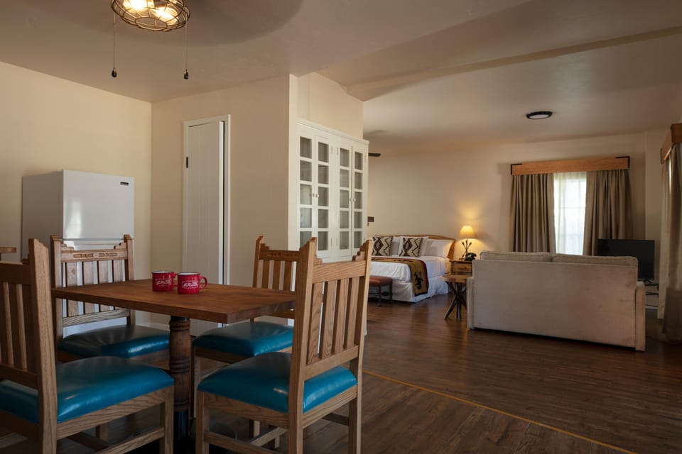 Elite Suite, 1 King Bed with Sofa bed, Pool View | 1 bedroom, desk, blackout drapes, iron/ironing board (on request)