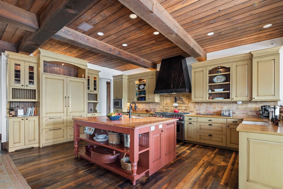 Fully equipped kitchen with impressive timber ceiling