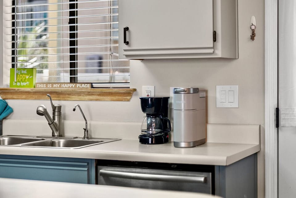 Fully stocked kitchen with Keurig and drip coffee maker — your morning coffee spot
