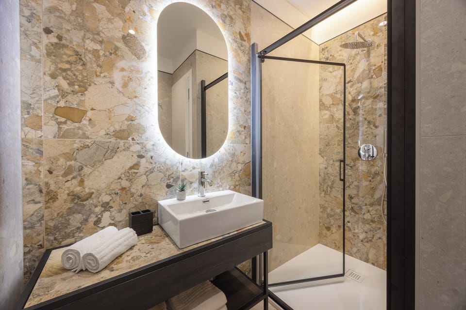 Suite with city View | Down comforters, minibar, in-room safe, blackout drapes