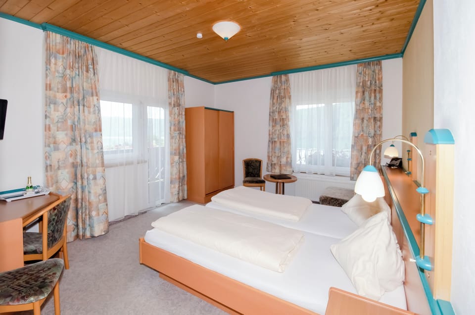 Family Room, Balcony, Lake View | In-room safe, blackout drapes, soundproofing, free WiFi