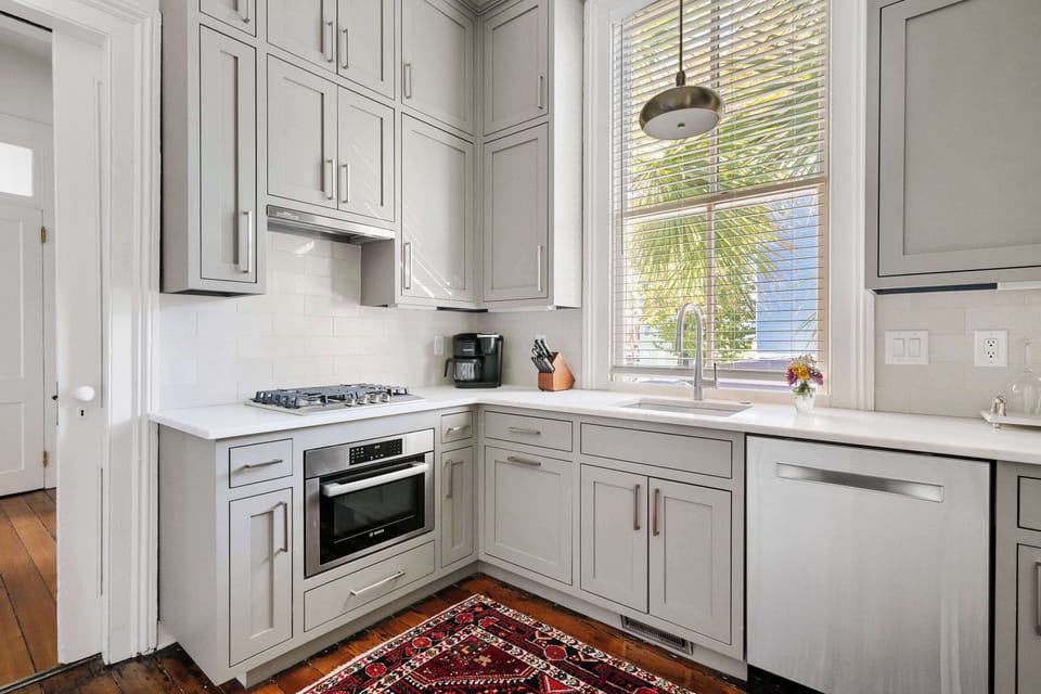Chef-inspired kitchen featuring luxury appliances and elegant designer finishes.