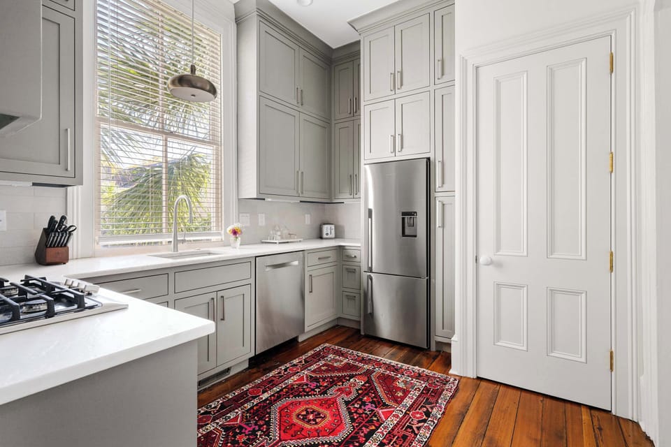 Chef-inspired kitchen featuring luxury appliances and elegant designer finishes.